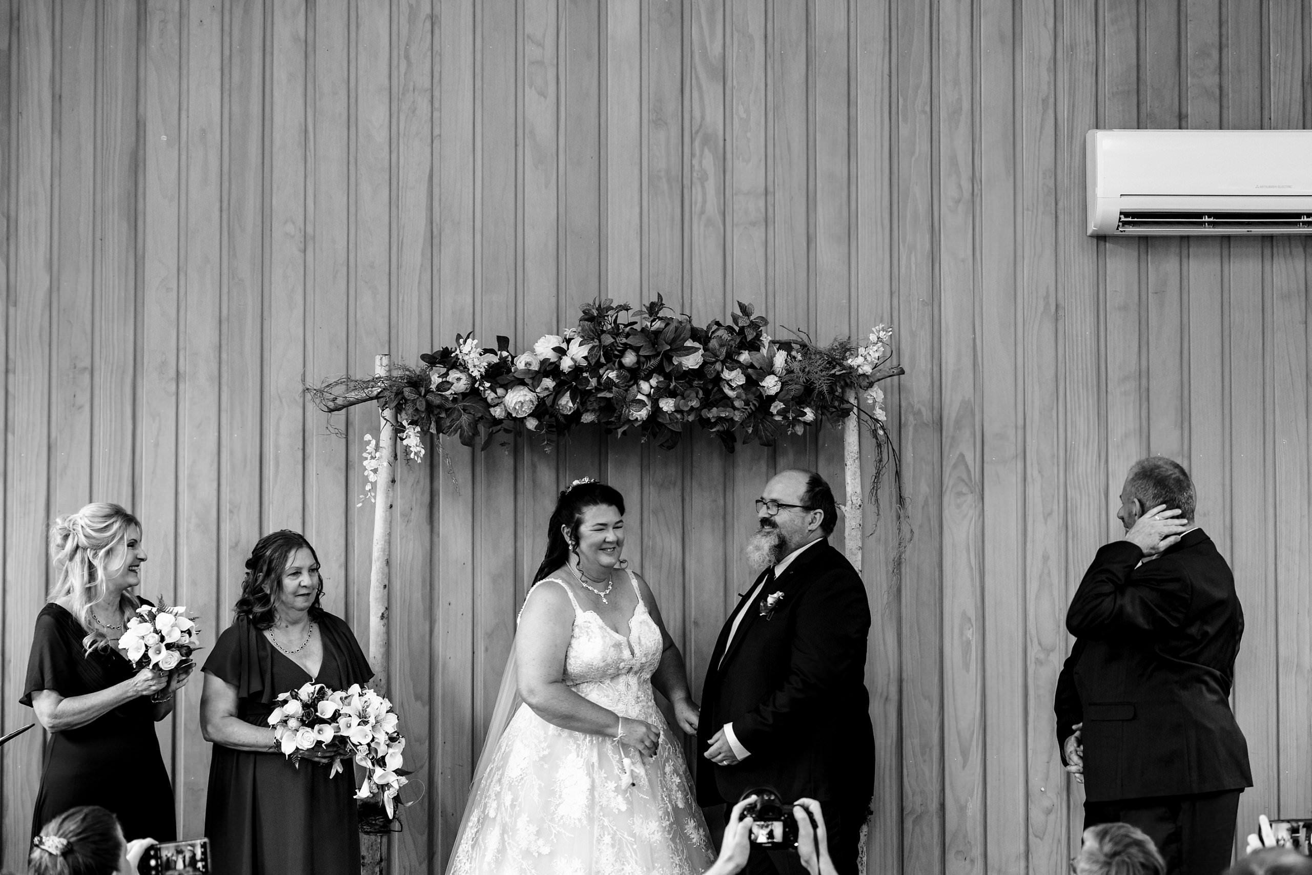 the bride and grooms wedding ceremony in the chapel was full of laughter at the old cheese factory