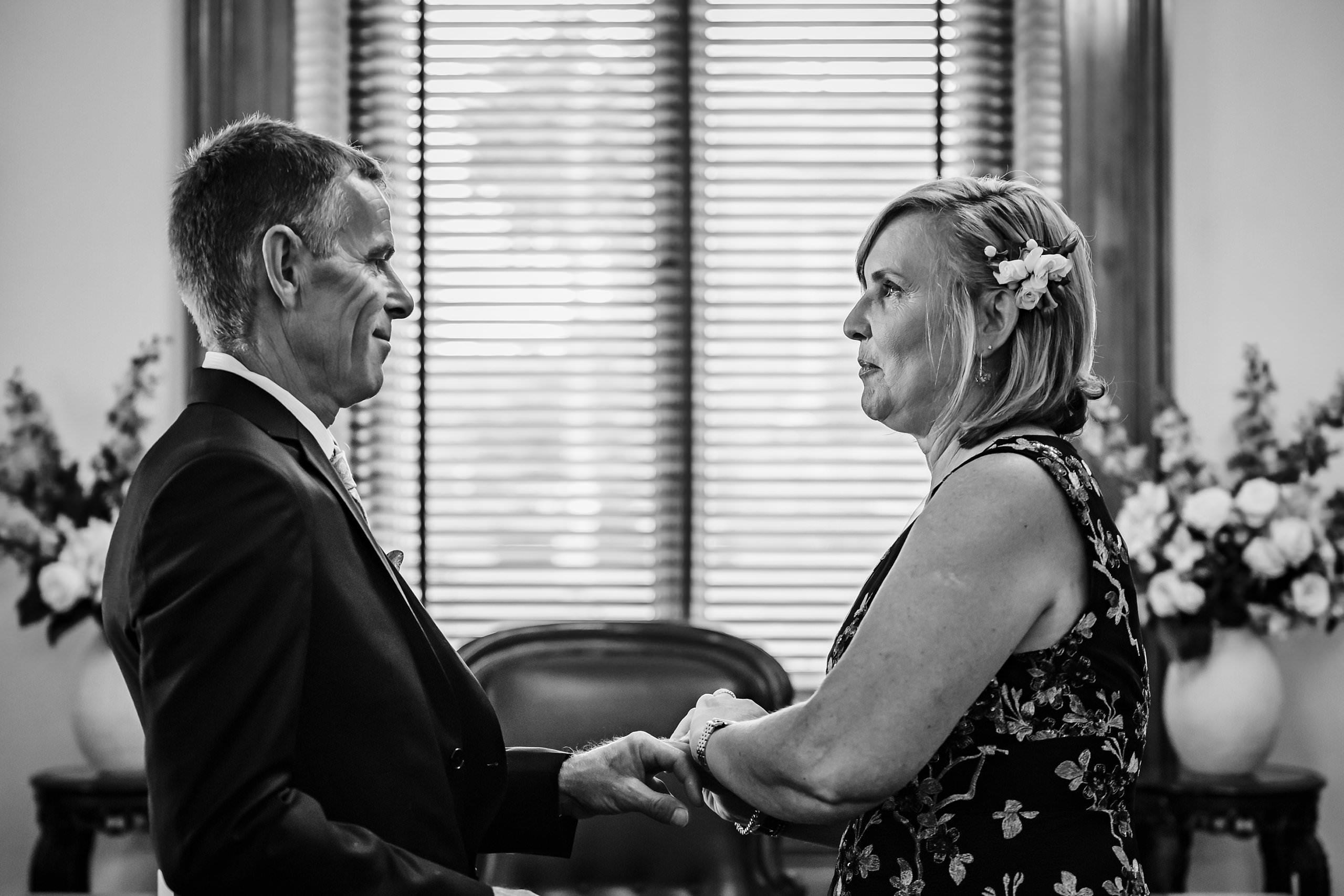 old treasury building wedding couple exchanging rings during ceremony