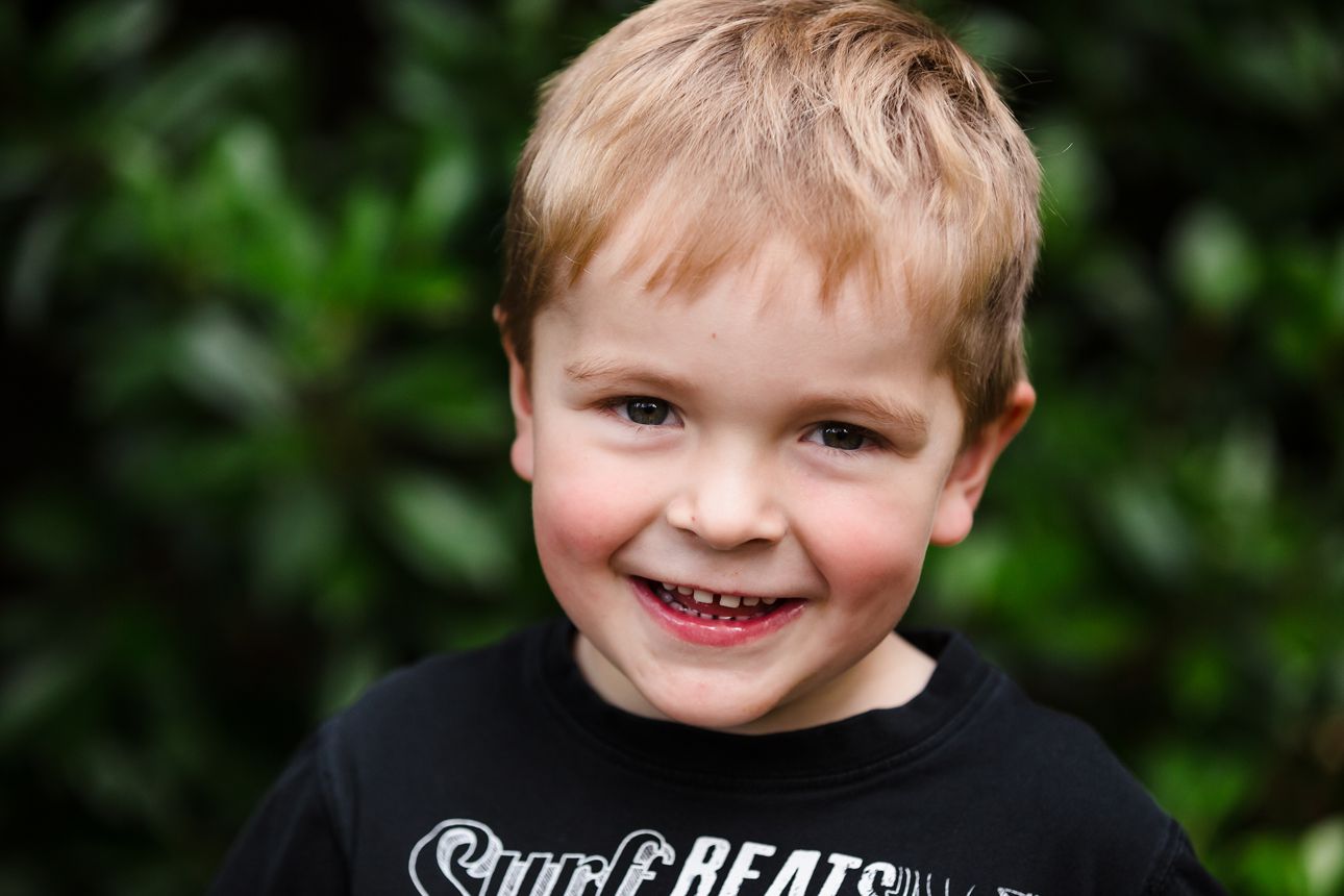 close up portrait of child during family portrait session at home